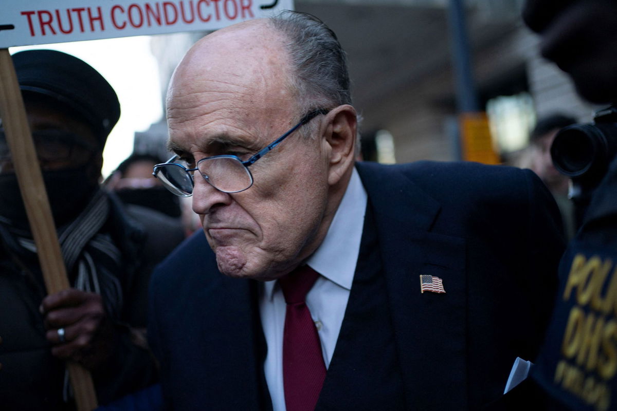 <i>Bonnie Cash/Reuters</i><br/>Former New York Mayor Rudy Giuliani departs the U.S. District Courthouse after he was ordered to pay $148 million in his defamation case in Washington