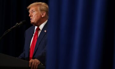 Former President Donald Trump attends a campaign event in Waterloo