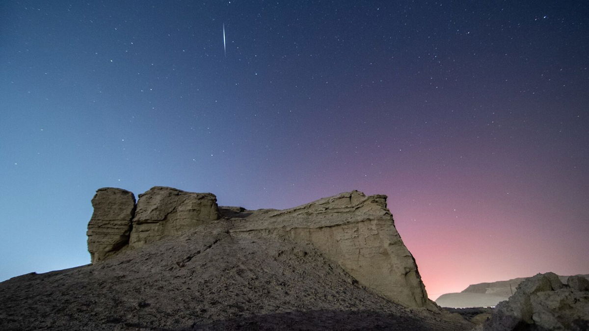 The Quadrantid meteor shower is seen in the night sky over the city of Korla in China's Bayingolin Mongolian Autonomous Prefecture, on January 4, 2022.