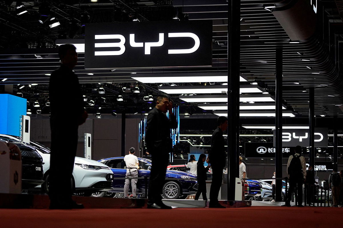 <i>Aly Song/Reuters</i><br/>Security guards stand at the BYD booth at the Auto Shanghai show