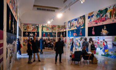 Visitors in the Polish pavilion at the 2022 Venice Biennale