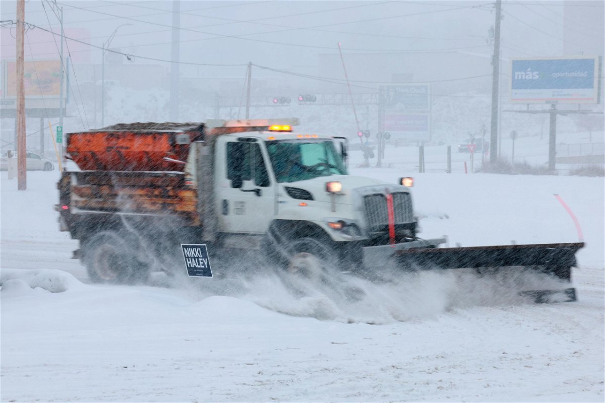 <i>Joe Raedle/Getty Images</i><br/>A snow plow gets to work in a powerful winter storm in Sioux City