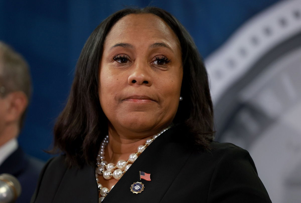 <i>Joe Raedle/Getty Images</i><br/>Fulton County District Attorney Fani Willis speaks during a news conference at the Fulton County Government building on August 14