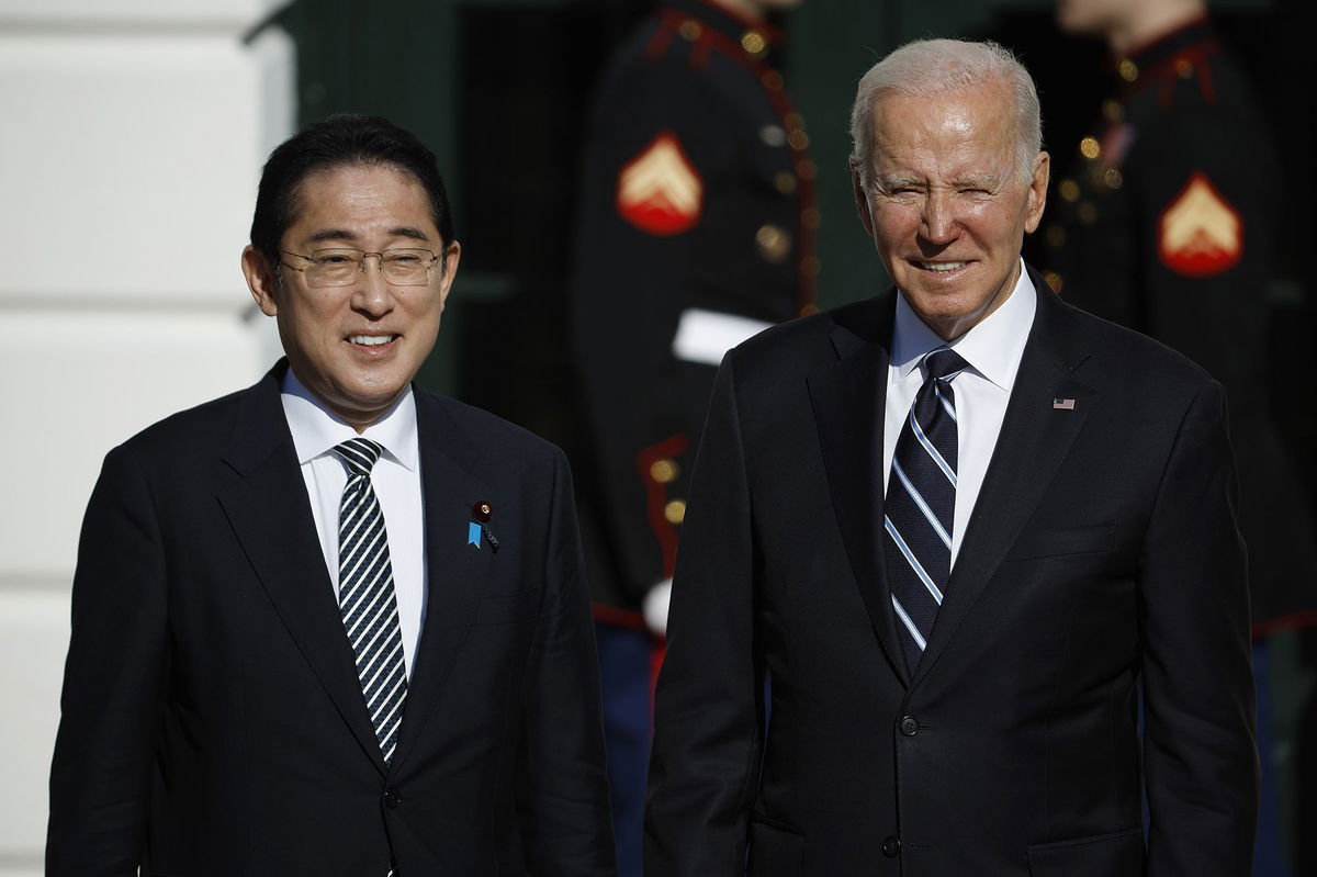 <i>Chip Somodevilla/Getty Images North America/Getty Images</i><br/>President Joe Biden poses for photographs with Japanese Prime Minister Kishida Fumio after his arrival at the White House on January 13