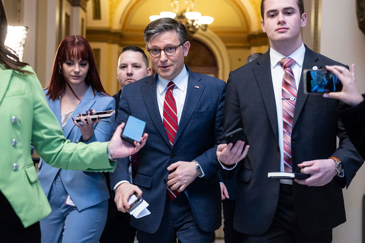 <i>Francis Chung/POLITICO/AP</i><br/>House Speaker Mike Johnson speaks with reporters as he departs a vote at the US Capitol on January 29.