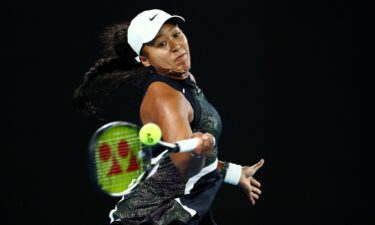 Naomi Osaka hits a forehand against Caroline Garcia in their first-round match at the Australian Open. Osaka’s return to grand slam tennis ended in a first-round defeat against Garcia.