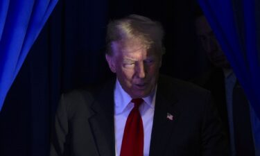 Former President Donald Trump arrives at a campaign event in Portsmouth