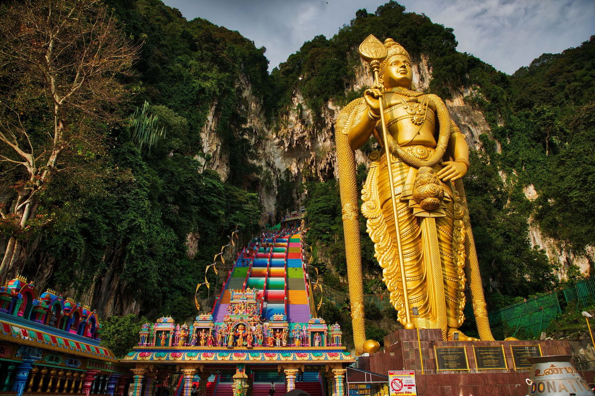 Batu Caves is one of Malaysia's most popular attractions. For some visitors, part of the appeal is climbing and conquering 272 steps to reach incredible limestone caves at the top.