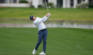 Nick Dunlap hits from the fairway on the eighth hole at the La Quinta Country Club course during the third round of The American Express golf tournament.