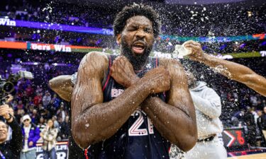 Embiid goes to the basket against the Spurs.