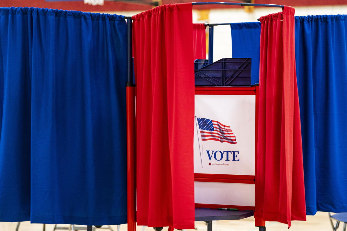 <i>Al Drago/Bloomberg/Getty Images</i><br/>A voting booth at a polling station inside Plymouth Elementary School in Plymouth