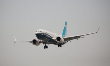 A Boeing 737 Max 7 aircraft lands during an evaluation flight at a Boeing Field in Seattle