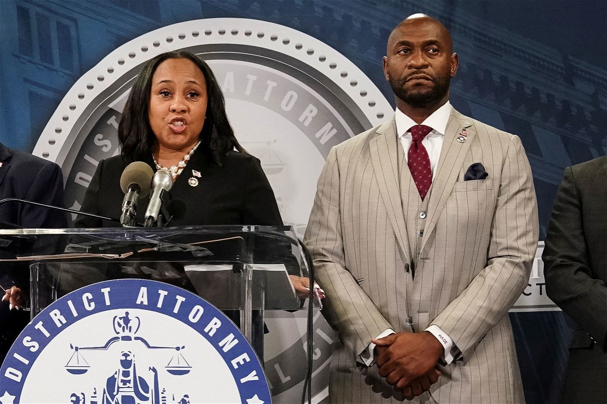 <i>Elijah Nouvelage/Reuters/File</i><br/>Fulton County District Attorney Fani Willis speaks at a press conference next to prosecutor Nathan Wade after a Grand Jury brought back indictments against former president Donald Trump and his allies in their attempt to overturn the state's 2020 election results