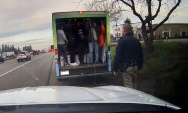 Officers have impounded a box truck after it was seen carrying several people in the back unrestrained along a California highway.