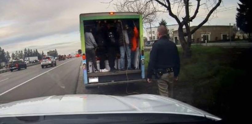 <i>CALIFORNIA HIGHWAY PATROL/KCAL</i><br/>Officers have impounded a box truck after it was seen carrying several people in the back unrestrained along a California highway.