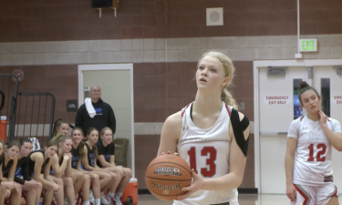 #13 Mia Walsh at free throw line in Madison's win