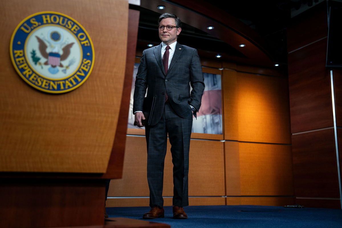 <i>Kent Nishimura/Getty Images</i><br/>Speaker of the House Mike Johnson (R-LA) listens during a news conference following the Republican conference meeting at the U.S. Capitol on January 17