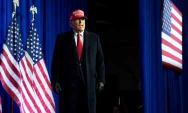 Former President Donald Trump arrives at an election rally in Waterford Township