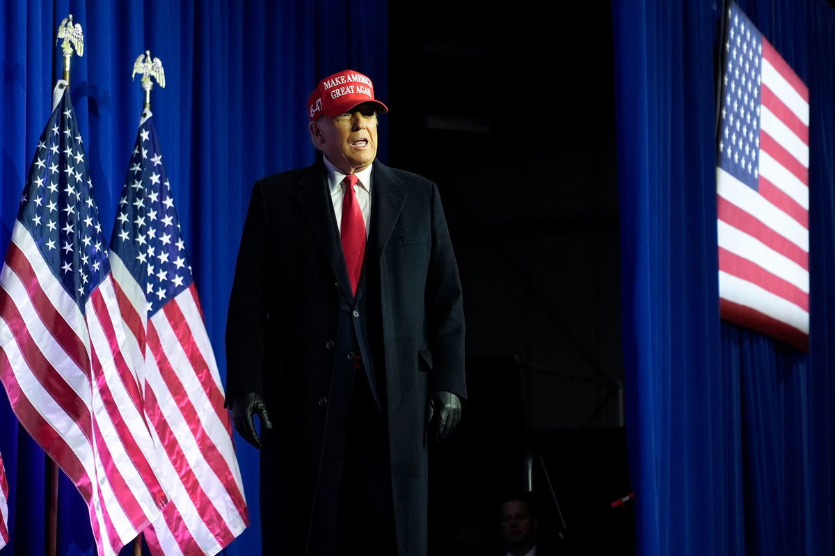 <i>Paul Sancya/AP</i><br/>Former President Donald Trump arrives at an election rally in Waterford Township