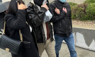 Alexander Smirnov (in the middle) leaving court in Las Vegas