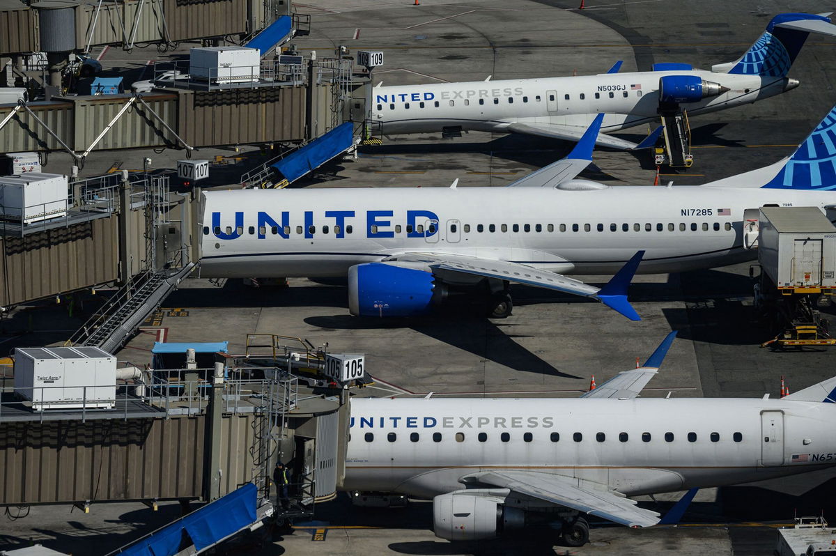 <i>Ed Jones/AFP/Getty Images via CNN Newsource</i><br/>United Airlines aircrafts are parked at Newark Liberty International Airport in Newark