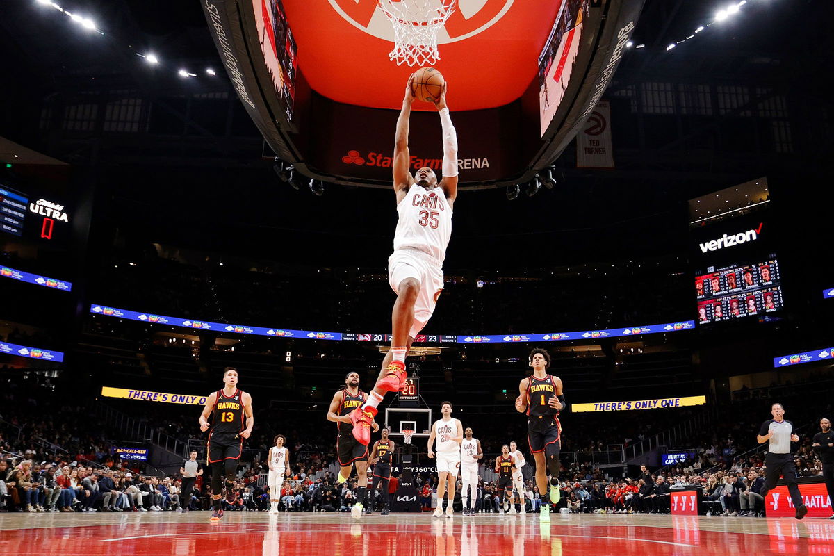 Tristan Thompson #13 of the Cleveland Cavaliers scores over the Atlanta Hawks during the first half at State Farm Arena on January 20, in Atlanta.