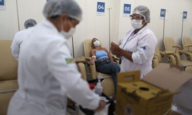 Nurses attend to patients at a dengue emergency medical care unit in Rio de Janeiro