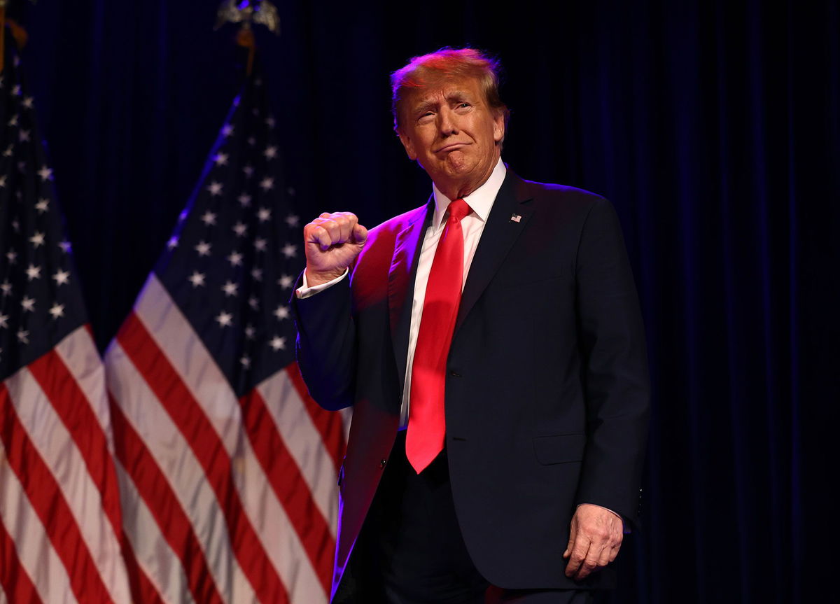 <i>Mario Tama/Getty Images</i><br/>Former President Donald Trump greets supporters at his Nevada caucus night watch party in Las Vegas on February 8