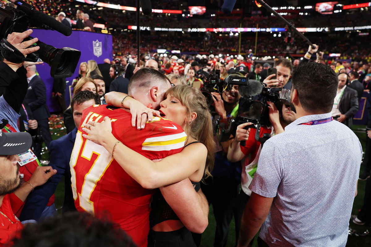 <i>Ezra Shaw/Getty Images</i><br/>Travis Kelce of Kansas City Chiefs and Taylor Swift embrace after defeating the San Francisco 49ers in overtime during Super Bowl LVIII.