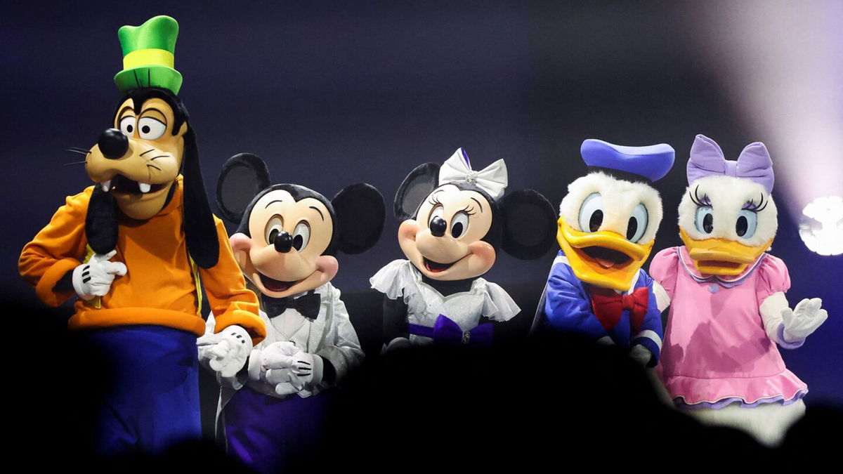 Disney characters stand onstage at the 2022 Disney Legends Awards during Disney's D23 Expo in Anaheim, California.