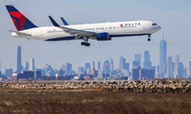 A Boeing jet arriving at New York's John F. Kennedy Airport. Employees at Delta will get profit sharing equal to about 10% of their annual pay