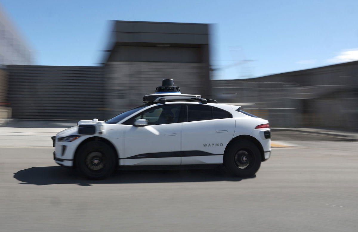 <i>Justin Sullivan/Getty Images/FILE</i><br/>A Waymo Jaguar I-Pace drives along a street on March 01