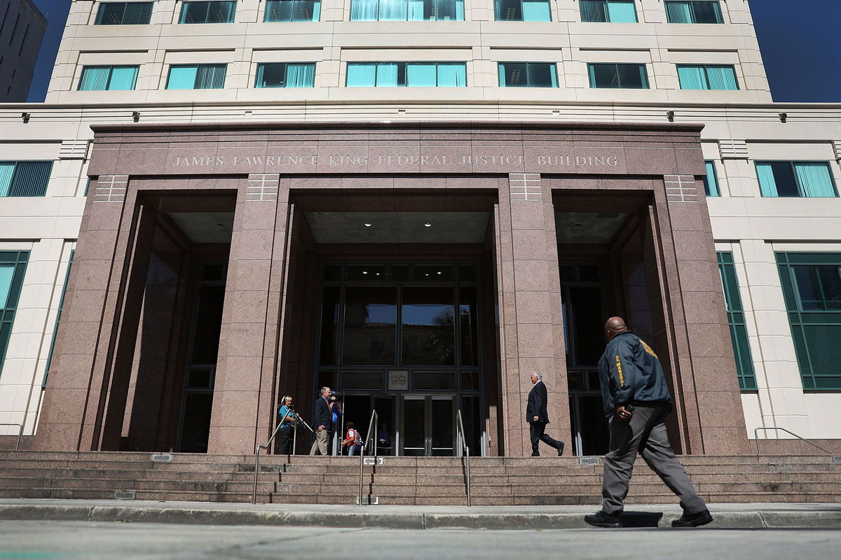 <i>Joe Raedle/Getty Images</i><br/>A member of the US Marshals Service walks in front of the federal district court in Miami