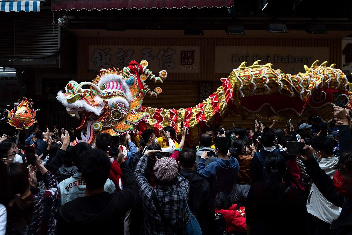 A 238 meter-long dragon dance is performed during celebrations on the first day of the Chinese lunar new year in Macau on January 22, 2023.