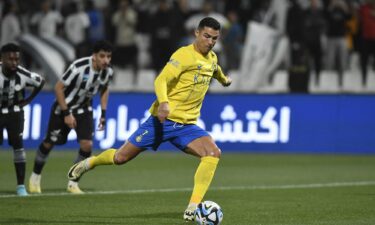 Ronaldo made the gesture in response to opposing fans chanting Lionel Messi's name.