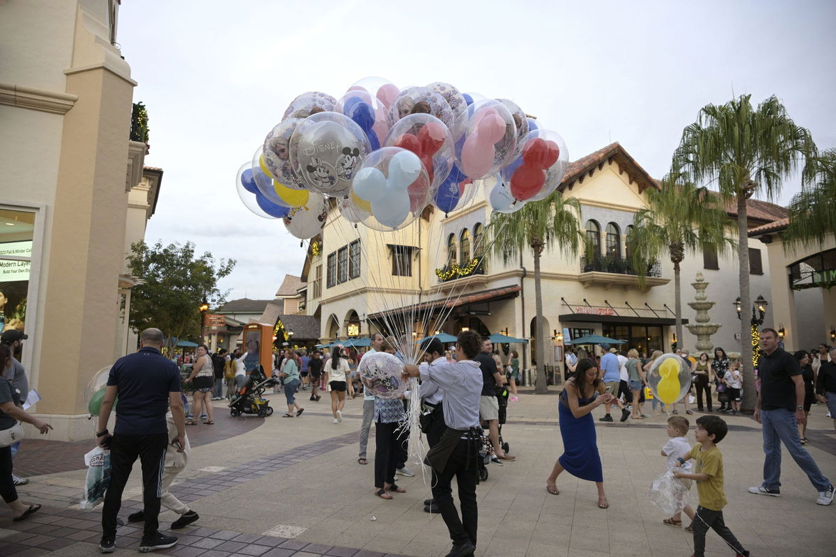 A man is suing Walt Disney Parks and Resorts and Raglan Road Irish Pub & Restaurant after his wife, a New York-based doctor, died suddenly shortly after eating at the restaurant. It's located in Disney Springs, the complex pictured in this December 2023 photo.