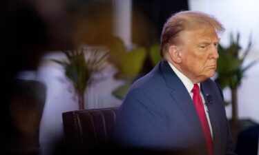 Former President Donald Trump participates in a virtual rally at Hotel Fort Des Moines in Des Moines