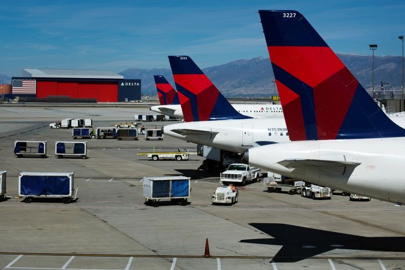 Delta planes line up at their gates while on the tarmac of Salt Lake City International Airport in Utah September 28, 2013.