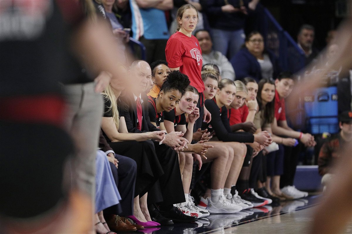 Players and staff on the Utah bench look on against Gonzaga.