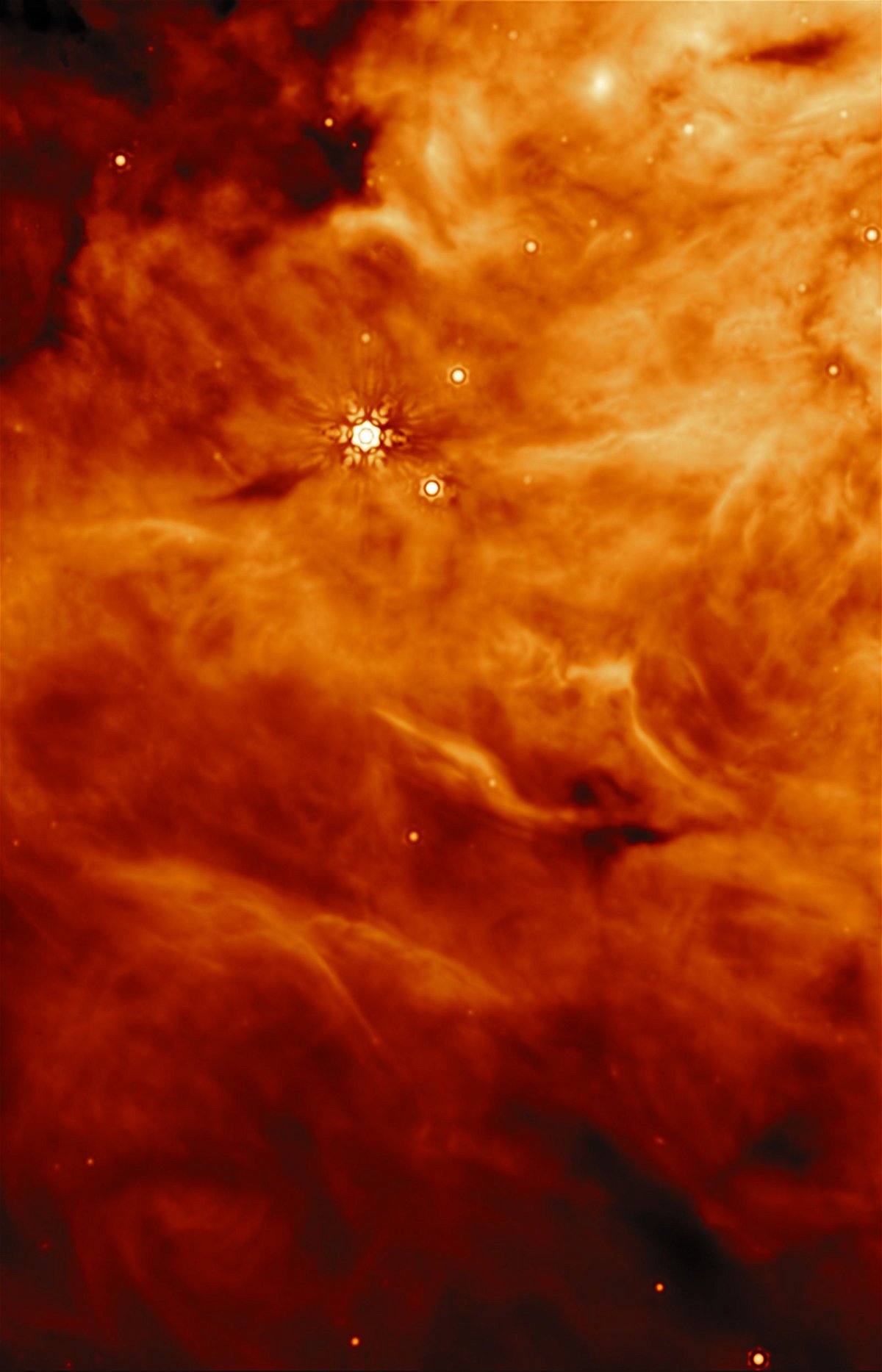 The James Webb Space Telescope's Mid-Infrared Instrument captured an image of a region parallel to the massive protostar known as IRAS 23385. The protostar is not visible in this image.