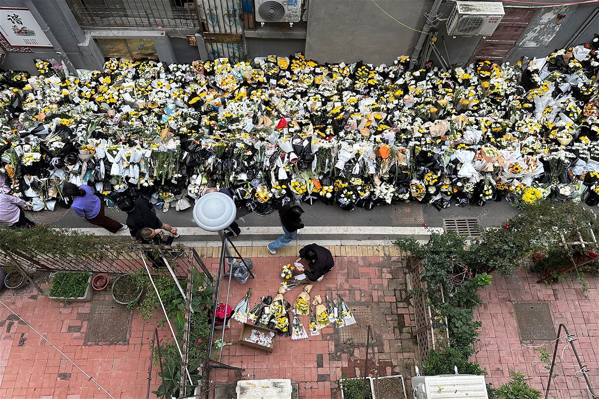 <i>Shen Xiang/Feature China/Future Publishing/Getty Images via CNN Newsource</i><br/>Bouquets of flowers laid in tribute to former Premier Li Keqiang outside his childhood residence in Anhui province