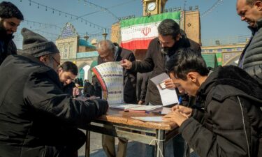 Iranian President Ebrahim Raisi casts his vote at a Tehran polling station on March 1.