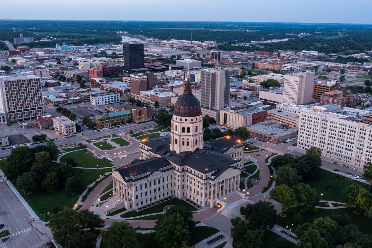 Twilight view of the state capitol building in downtown Topeka.