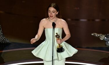 Emma Stone accepting the award for lead actress for 'Poor Things' at the 2024 Oscars in Hollywood.