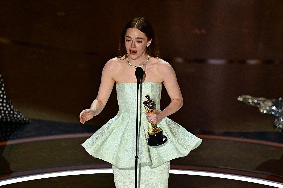<i>Patrick T. Fallon/AFP/Getty Images via CNN Newsource</i><br/>Emma Stone accepting the award for lead actress for 'Poor Things' at the 2024 Oscars in Hollywood.