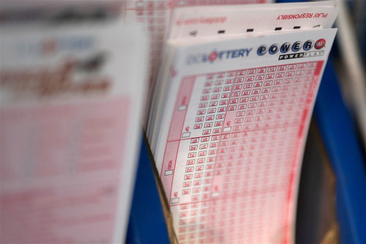 The Powerball jackpot climbs to a colossal $800 million for Monday night’s drawing. Powerball tickets are seen at a liquor store in Washington in 2023.