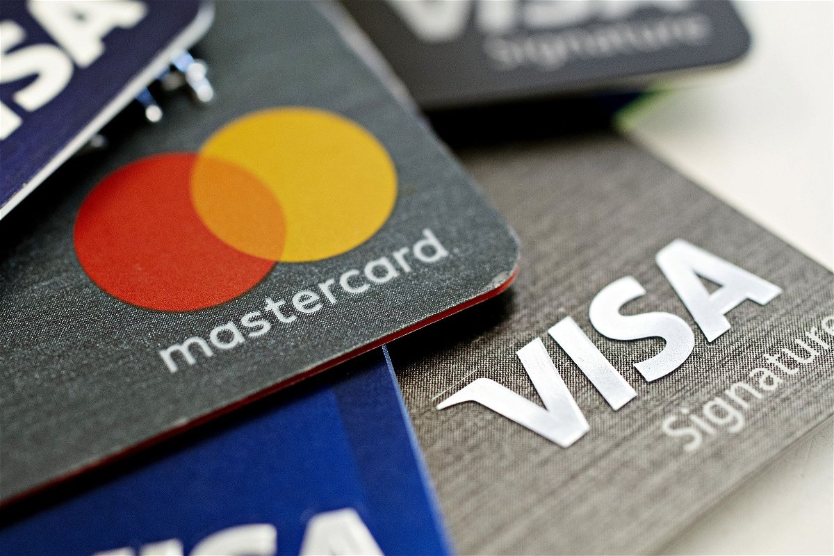 <i>Daniel Acker/Bloomberg/Getty Images via CNN Newsource</i><br/>Visa and Mastercard have agreed to settle a case aimed at lowering merchant fees.