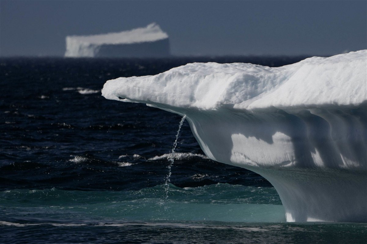 <i>Olivier Morin/AFP/Getty Images via CNN Newsource</i><br/>Flowing water from melting ice in Scoresby Fjord