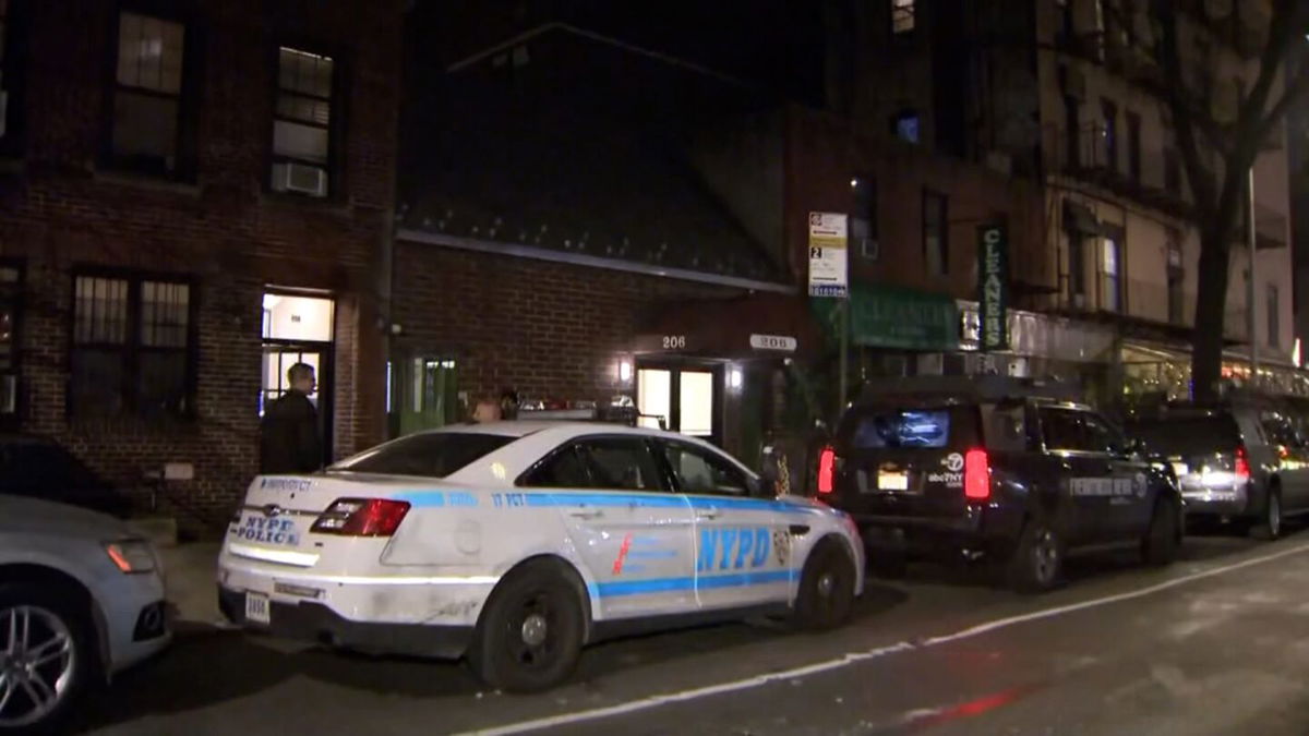 <i>WCBS via CNN Newsource</i><br/>Police are seen outside of the building