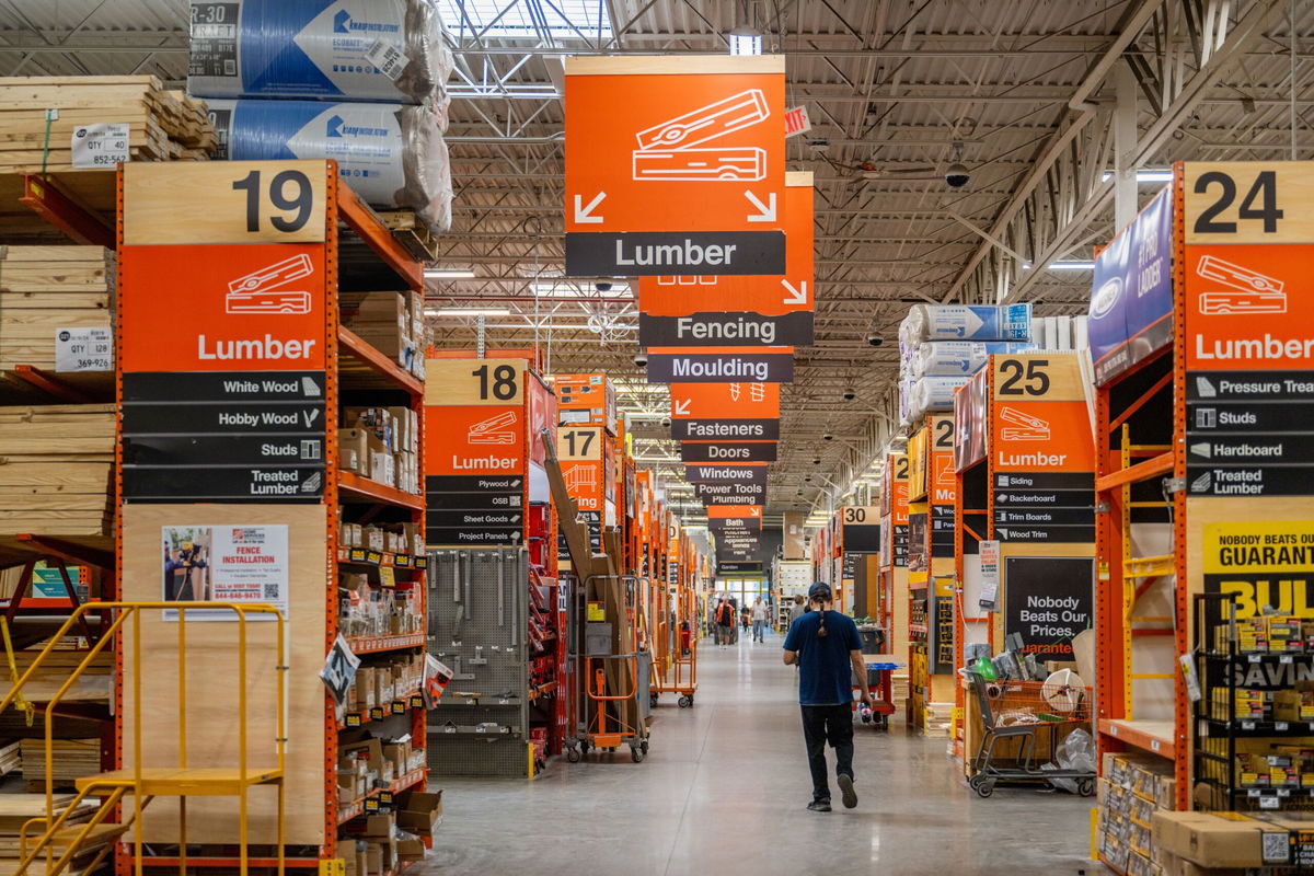 Home Depot is expanding its business targeting professional contractors and builders as the home fixer-upper market stalls. A customer walks through a Home Depot store on February 20  in Austin, Texas.